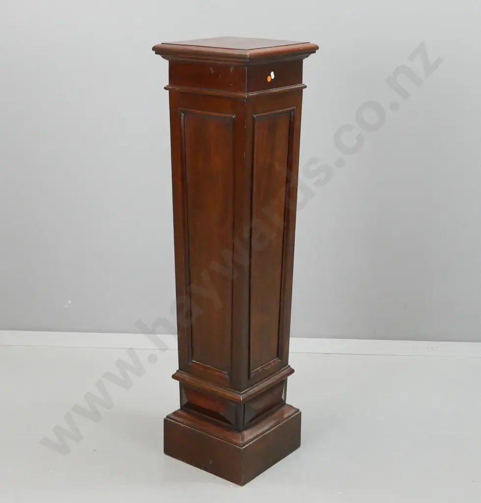 vintage mahogany and walnut plinth / display stand with panelled tapered sides, square top, plinth base. Top has split. Image 1++