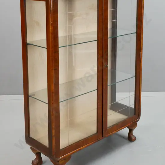 walnut art deco cab-leg 2-door display cabinet with glazed sides, door glass has cut lineal pattern, on ball and claw