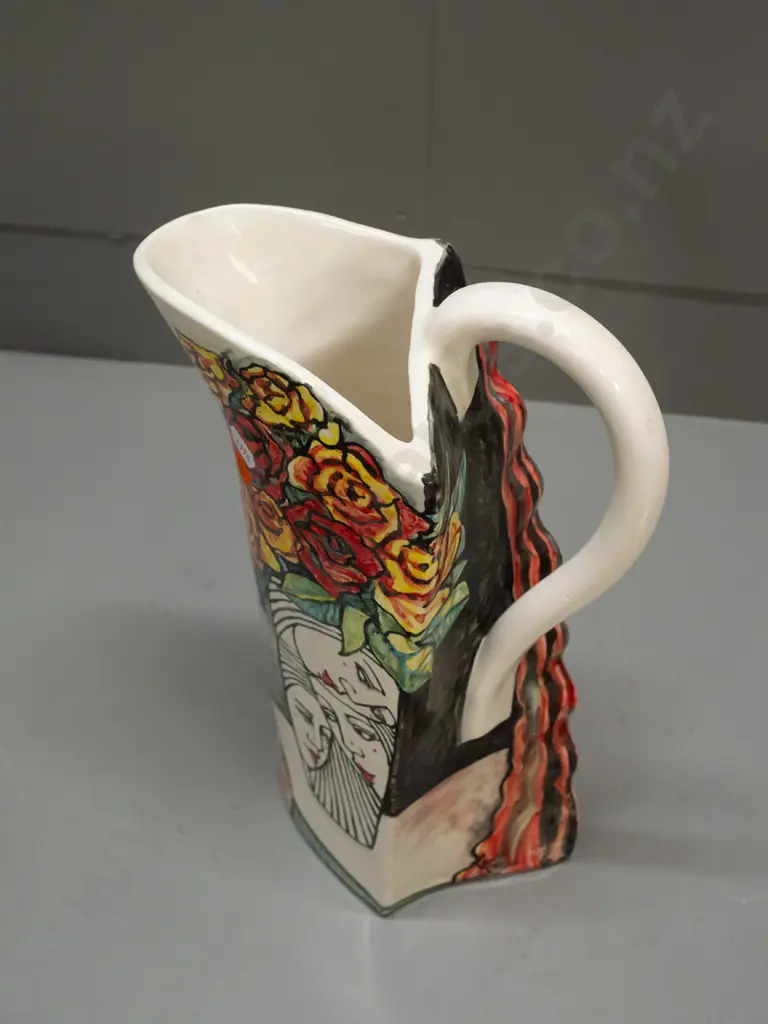 Louise Rive / Edge City NZ studio pottery hand painted tall jug - female head and roses H-340 W-200 handle to spout Image 1++