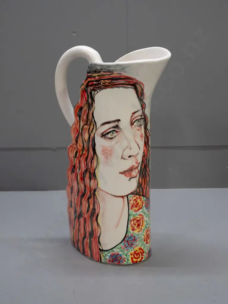 Louise Rive / Edge City NZ studio pottery hand painted tall jug - female head and roses H-340 W-200 handle to spout Image 1++