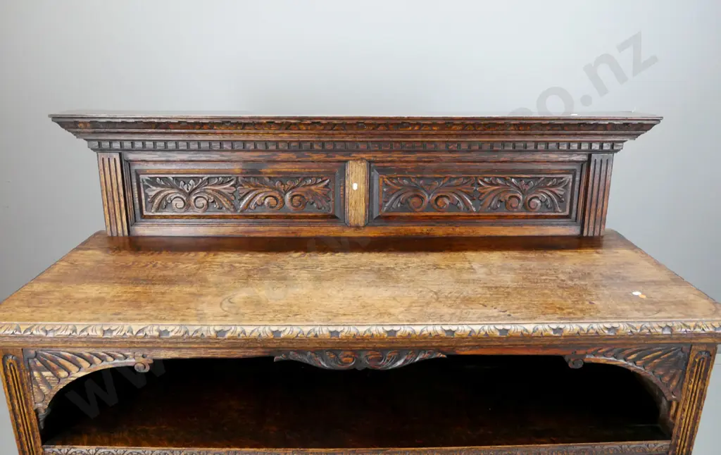 19th century French oak serving sideboard with upstand, foliate carved panels and gallery opening, 2 drawers with lion's Image 1++