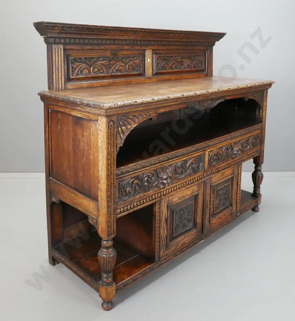 19th century French oak serving sideboard with upstand, foliate carved panels and gallery opening, 2 drawers with lion's Image 1++