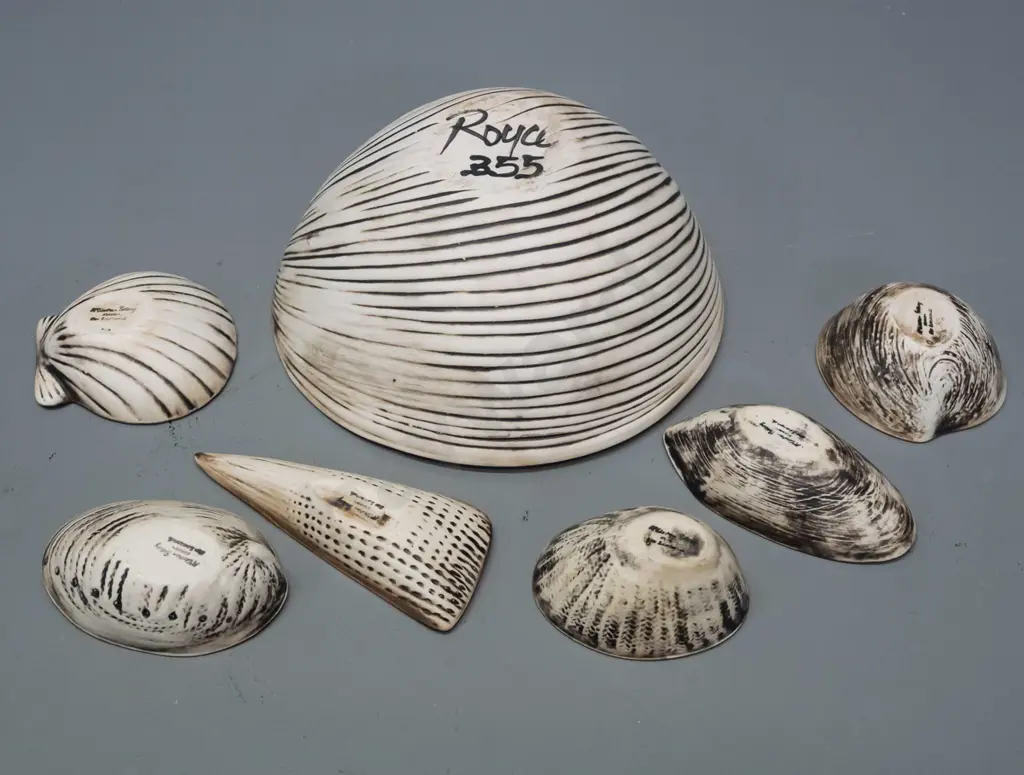 Royce McGlashen shell shaped studio pottery items - large bowl and 6 small various-shaped bowls - large bowl has small Image 1++