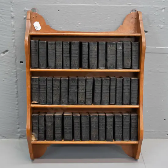 set of miniature books - Shakespeare's plays, abridged editions, published Allied Newspapers Ltd London, with wall