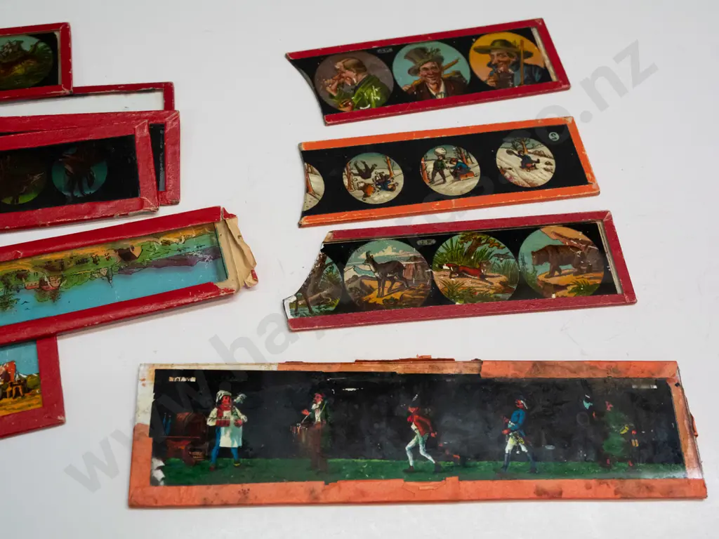 33 vintage lantern slides and a box for a magic lantern, no lantern included. Slides in 4 different sizes, largest are Image 1++