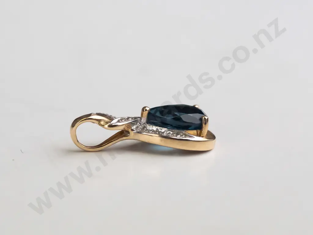 9ct gold drop pear shaped blue topaz & diamond drop pendant 1.3 gms Image 1++