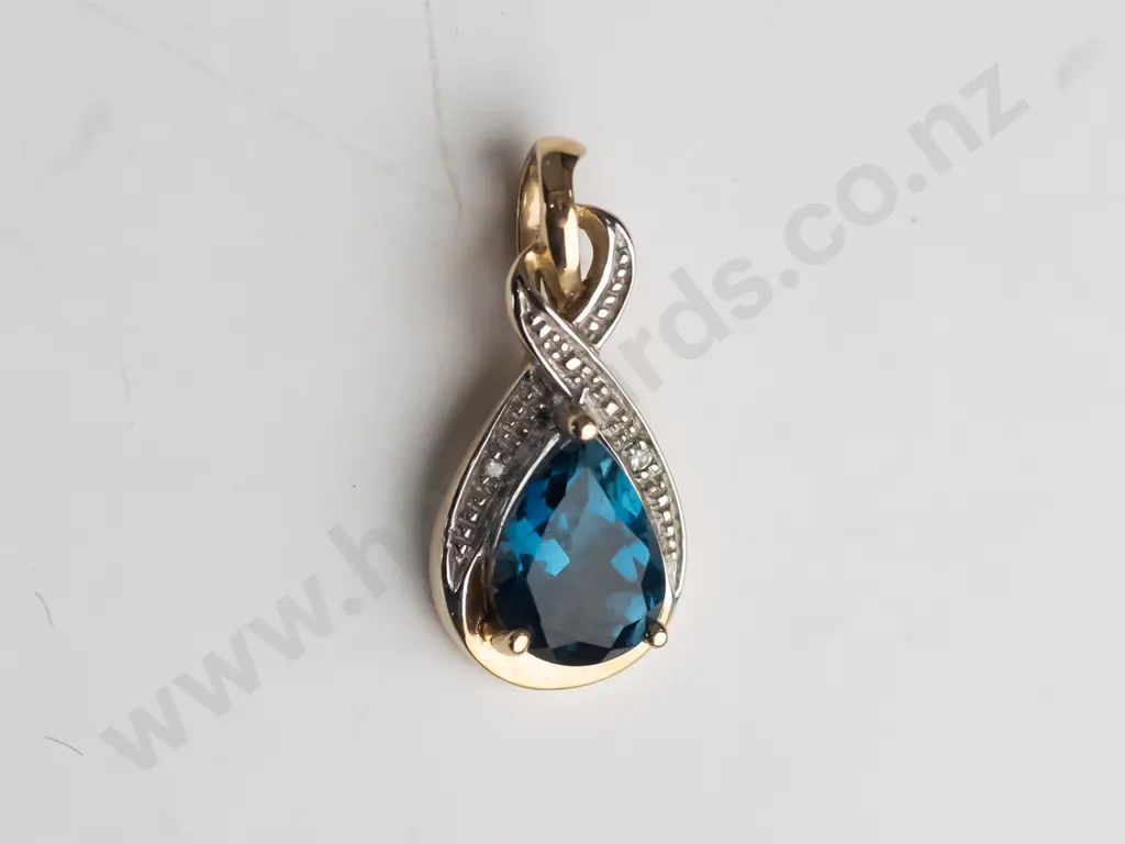 9ct gold drop pear shaped blue topaz & diamond drop pendant 1.3 gms Image 1++