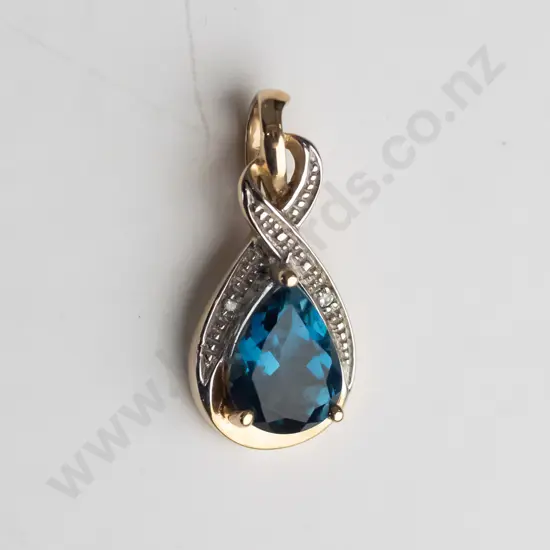 9ct gold drop pear shaped blue topaz & diamond drop pendant 1.3 gms
