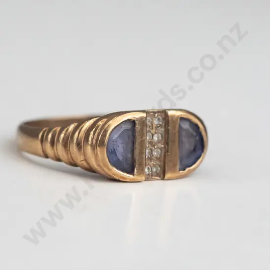 9ct ring set with white stone & purplish coloured stones 3.3gms