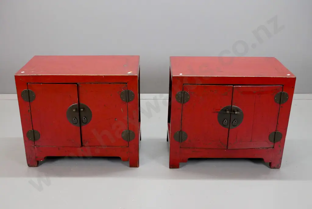 pair of Chinese red lacquered 2-door cupboards with circular metal plate and bar locks, circular hinges, restored Image 1++