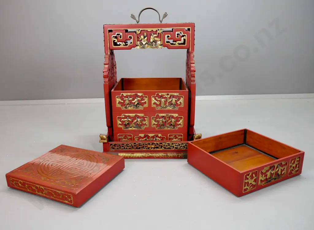 Chinese red lacquered wedding / food storage chest with carved, pierced and gilded decoration, metal binding and top Image 1++