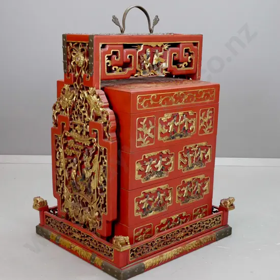 Chinese red lacquered wedding / food storage chest with carved, pierced and gilded decoration, metal binding and top