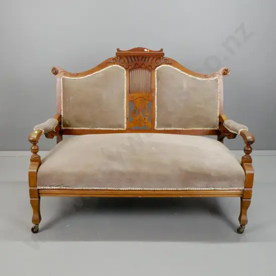vintage European walnut 2-seater settee with pierced and carved back splat, shaped top rail, carved open arms, on
