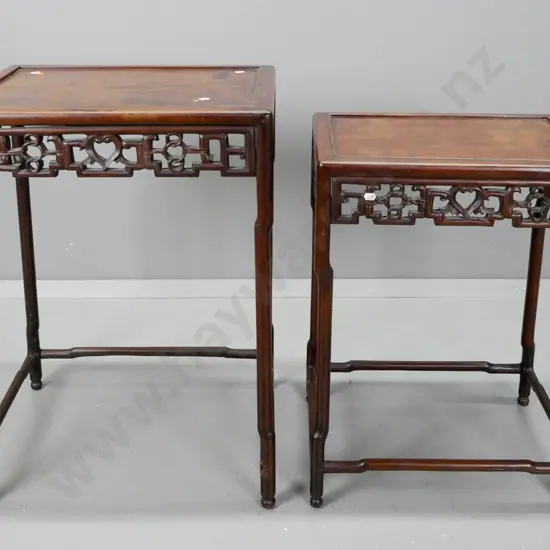 2 vintage asian hardwood side tables with stretcher base, pierced geometric side panels, panelled top. Larger is missing