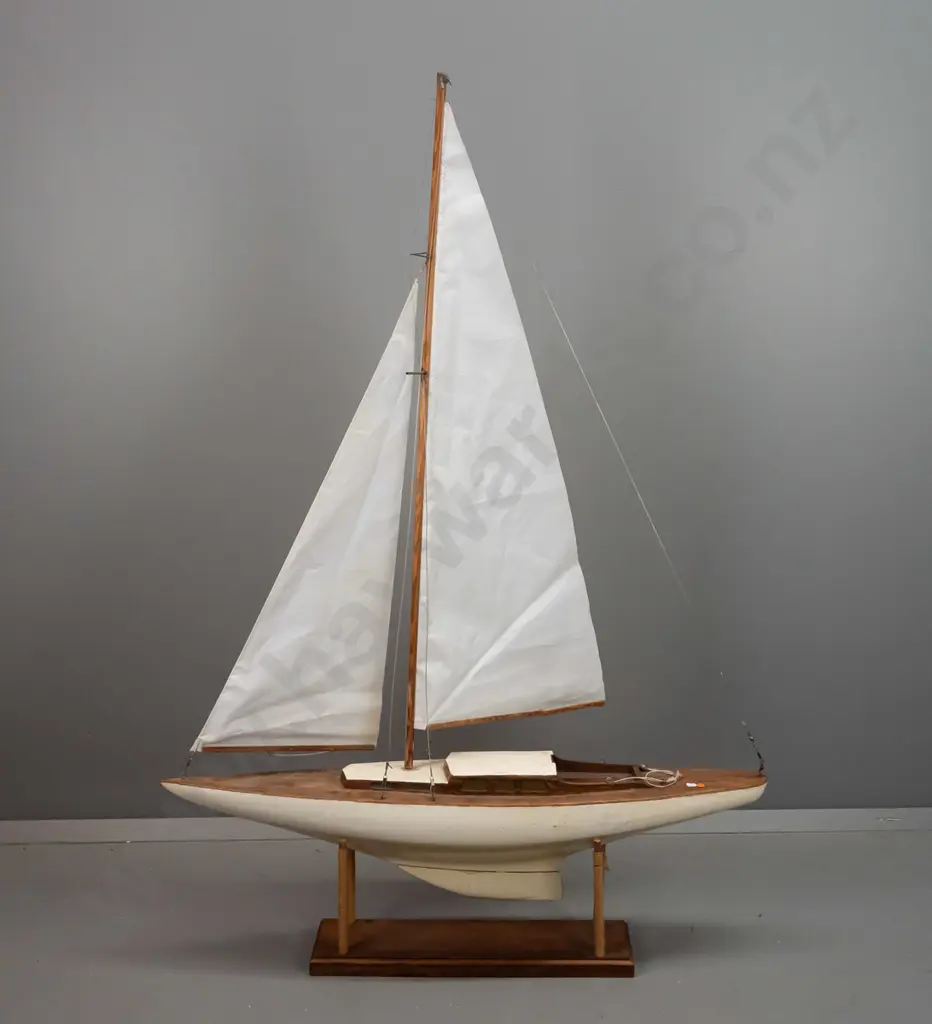 vintage pond yacht on wooden stand, has had sails replaced, one sail boom is broken, some age wear and damage, two Image 1++