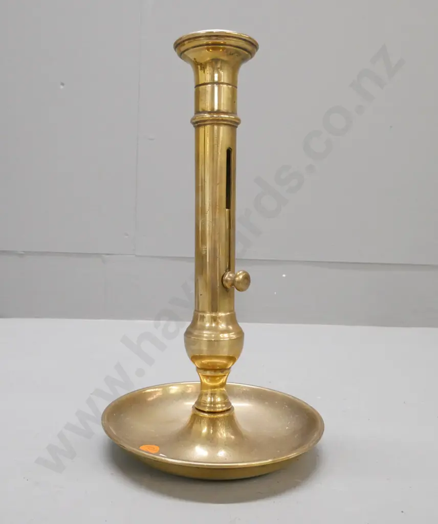 Vintage brass table candle holder w/ sliding ejector. Some pitting to surface H-290 D-160 Image 1++