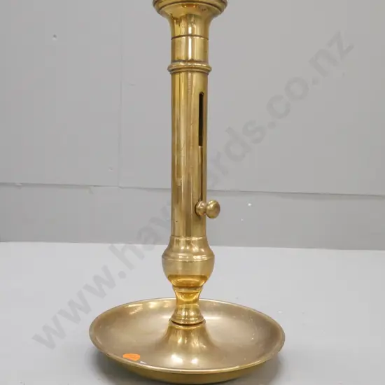 Vintage brass table candle holder w/ sliding ejector. Some pitting to surface H-290 D-160