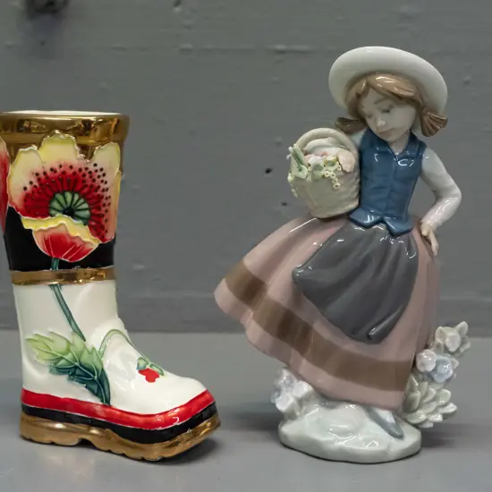 Lladro girl with flower basket figurine H-170 and a Tupton Ware hand painted tube-lined boot with poppies