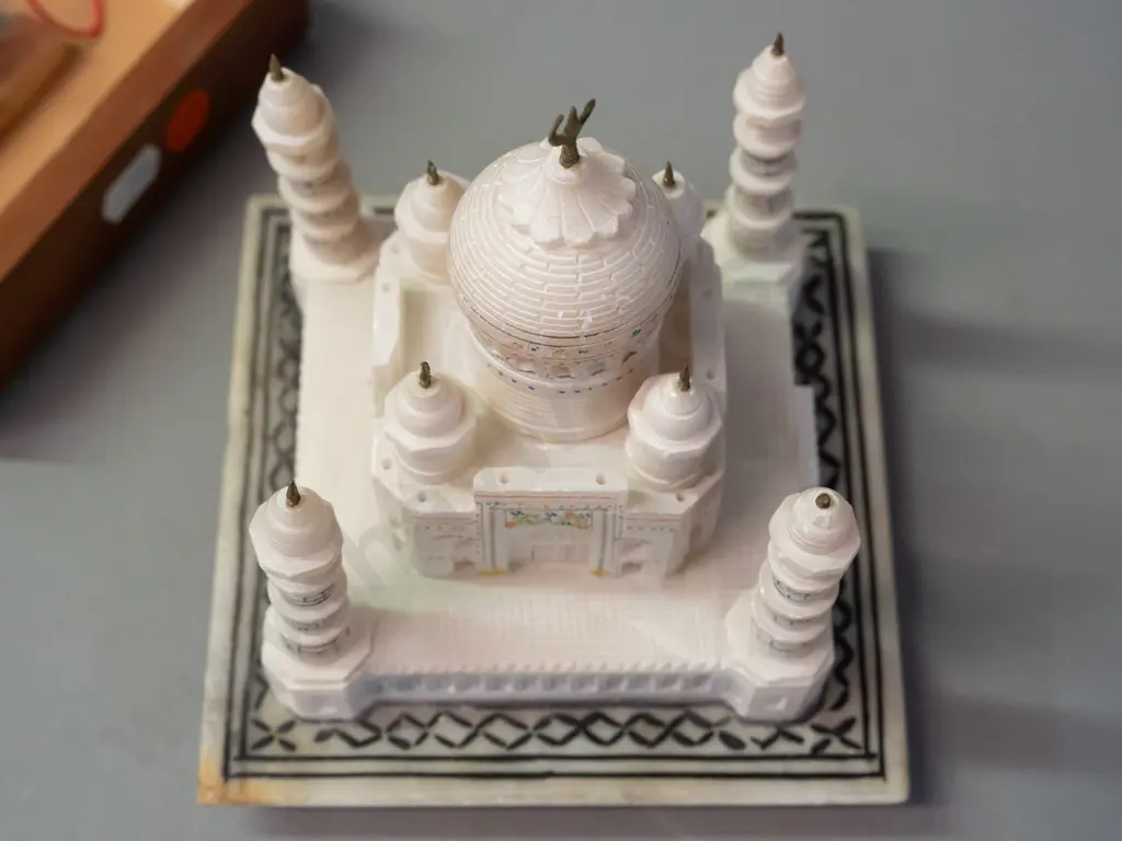 souvenir carved and pierced alabaster model of the Taj Mahal on marble and timber base, with lamp & battery. Small chip Image 1++