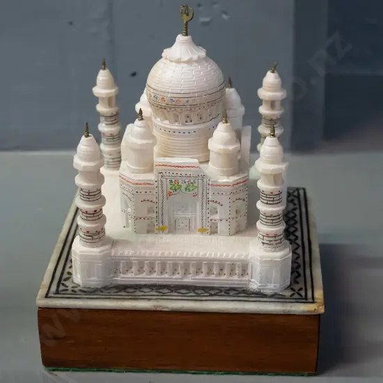 souvenir carved and pierced alabaster model of the Taj Mahal on marble and timber base, with lamp & battery. Small chip