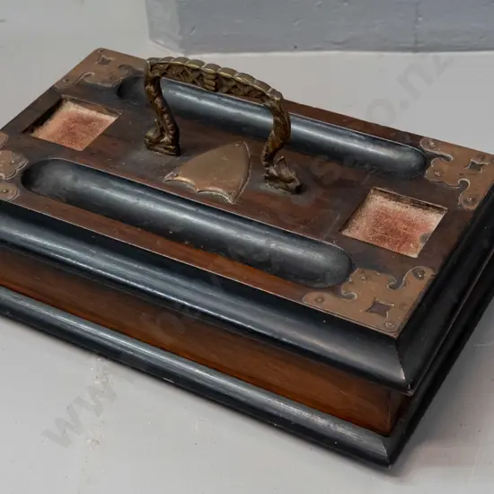 vintage walnut pen stand with drawer, metal corner brackets and shield, pressed metal dolphin handle, no inkwells, some