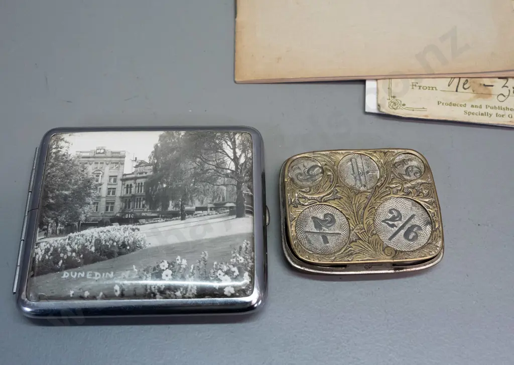 Cigarette case with Dunedin photo, Royal Albatross booklet, English spring loaded coin holder, and assorted postcards & Image 1++