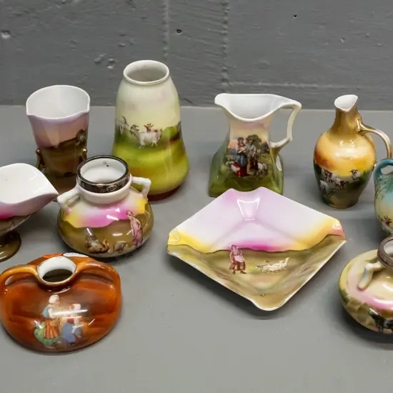 10 assorted pieces of hand painted Bayreuth china, 2 with sterling silver rims, half have no maker's marks - some have