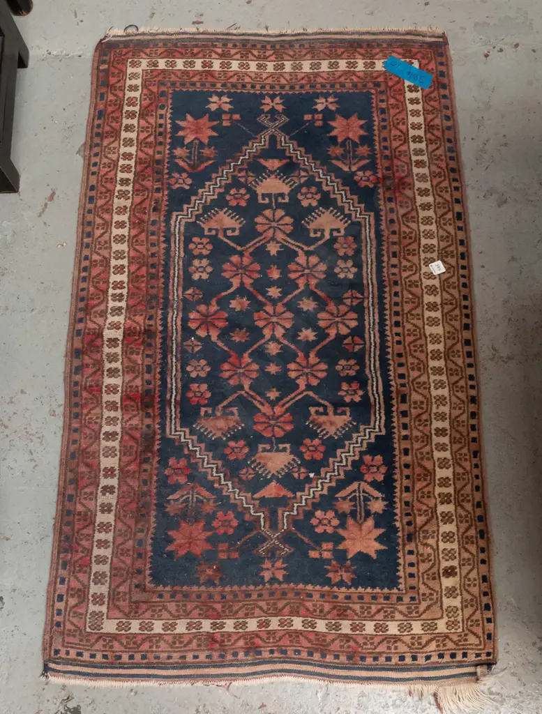 Persian style hand woven wool floor rug - reds and blues - fading and heavy wear to fringe L-1280 W-760 Image 1++