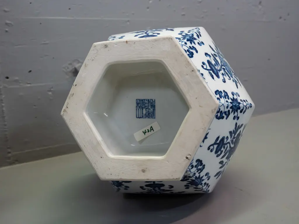 pair of heavy blue and white Chinese vases with faceted hexagonal shape at top - see photo for character mark on base Image 1++