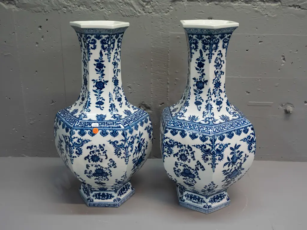 pair of heavy blue and white Chinese vases with faceted hexagonal shape at top - see photo for character mark on base Image 1++