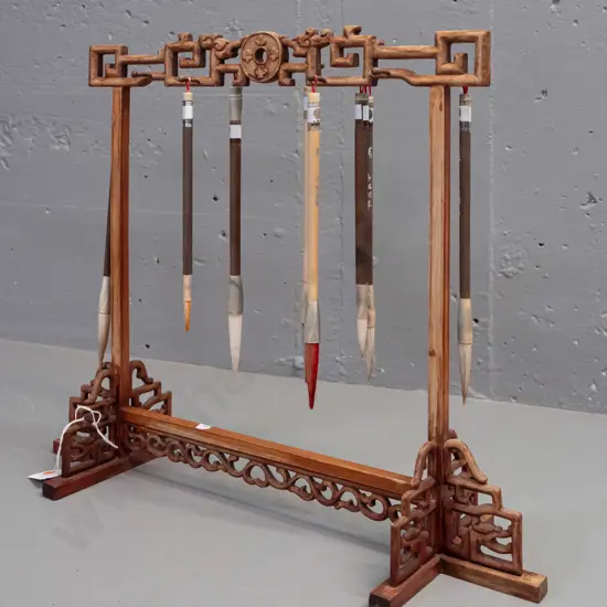 Chinese intricately craved timber brush stand with 8 brushes - missing one small hanging peg, finish is worn overall