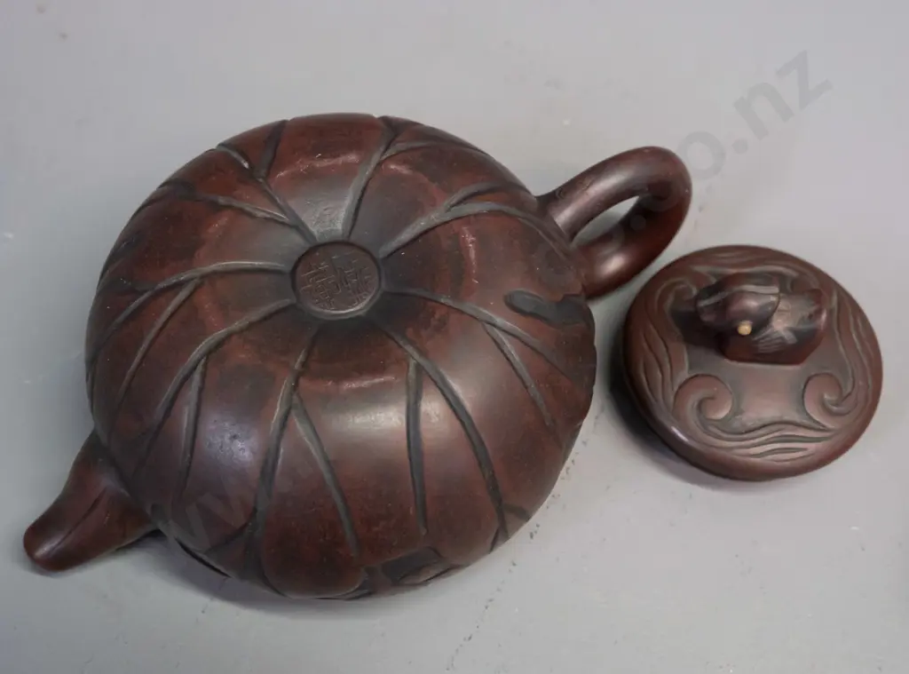 3 Chinese Yixing clay tea pots and 2 small tea bowls, one with leaf & tree forms has small chip in underside of lid, is Image 1++
