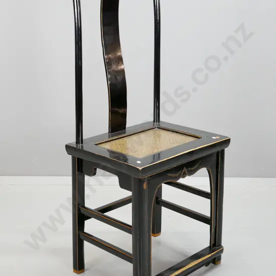 Chinese elm yoke back chair with black laquer finish, woven cane seat panel, shaped brackets on sides, on stretcher base