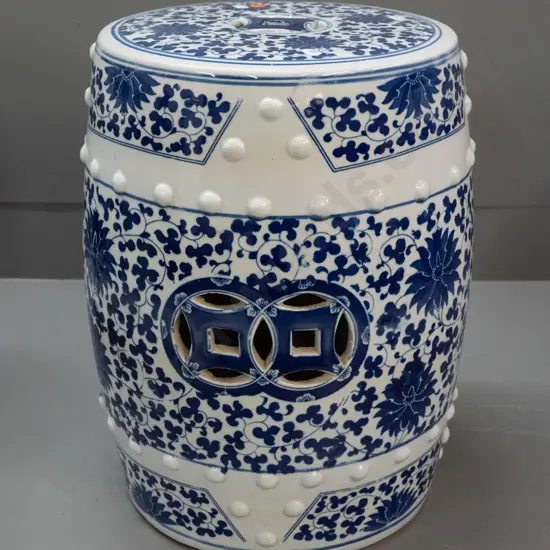 Chinese blue and white ceramic garden seat with pierced cutouts in top and sides, raised stud pattern H-420 D-290 at top