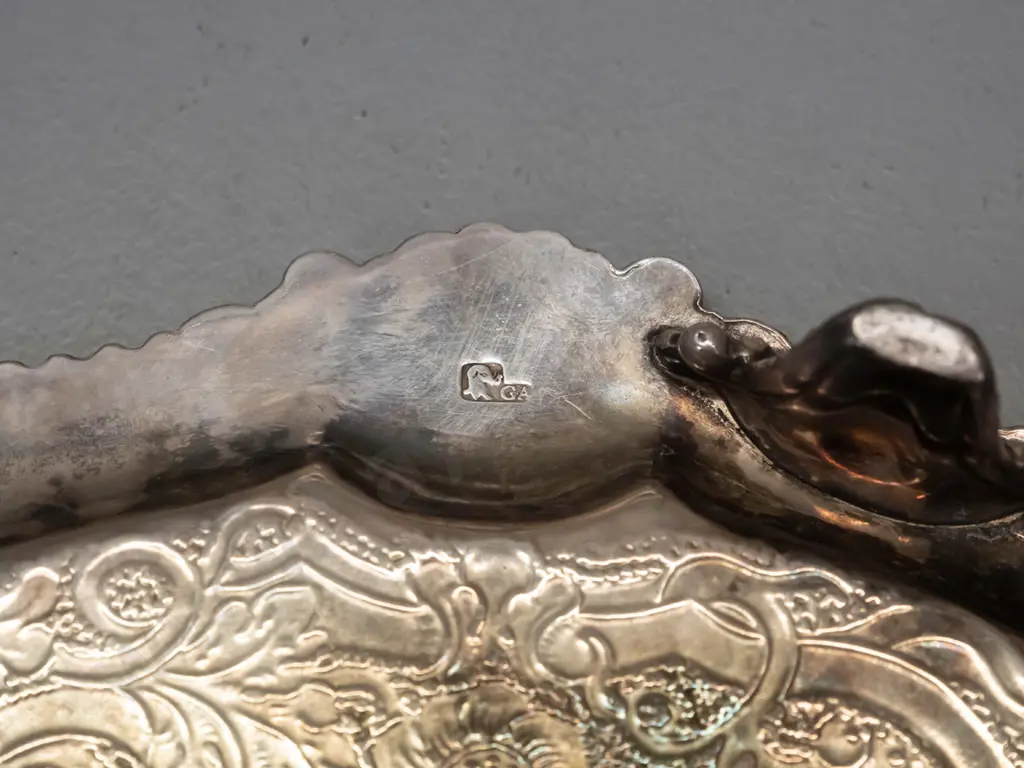 2 Royal Doulton display plates and a rococo style silver plated tray on scroll feet, marked GA with elephant head logo. Image 1++