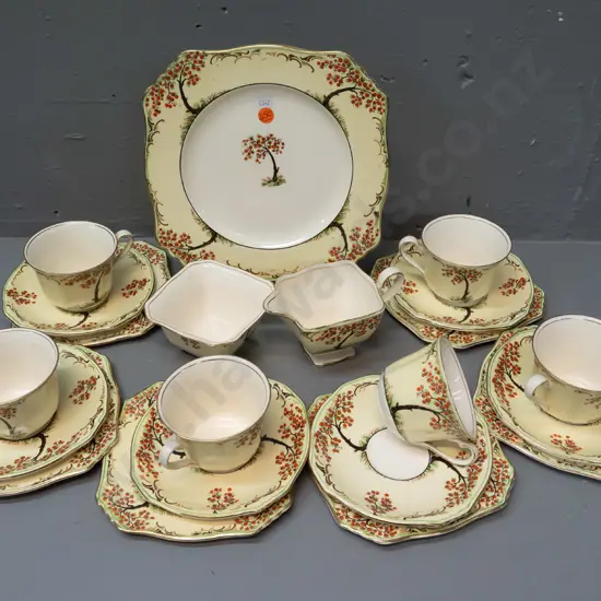 Royal Winton "Ye Fruitful Tree" pattern 21-piece tea set - hairline flaw to one cup rim