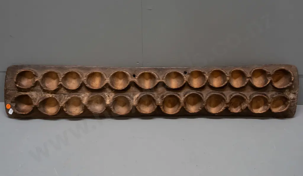 carved wood mancala style game board - Enkeshui / Maasai Kenya. Some age wear and chips. L-830 W-160 Image 1++