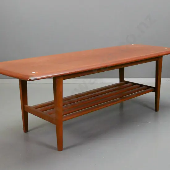 retro mahogany coffee table with slatted magazine shelf, tapered legs - has rings and staining to top surface H-430