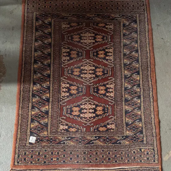 Persian style hand woven wool small floor rug - browns and blues, some fading L-980 W-660