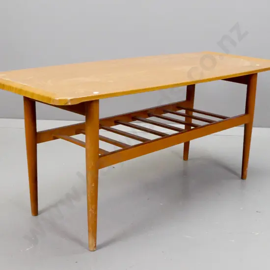 retro coffee table faux teak veneer top on round tapered legs with slatted magazine rack. H-470 W-1070 D-420