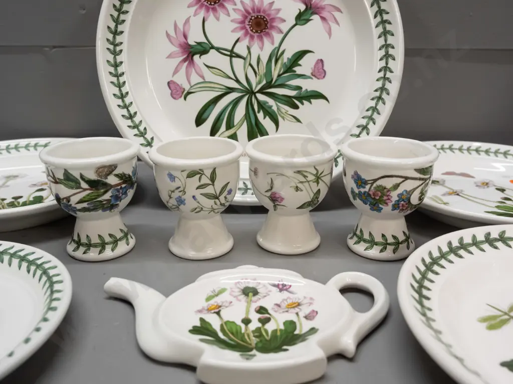 assorted Portmeirion 'The Botanic Garden' pattern items:  Four plates, four eggcups, teapot-shaped dish, unmarked saucer Image 1++
