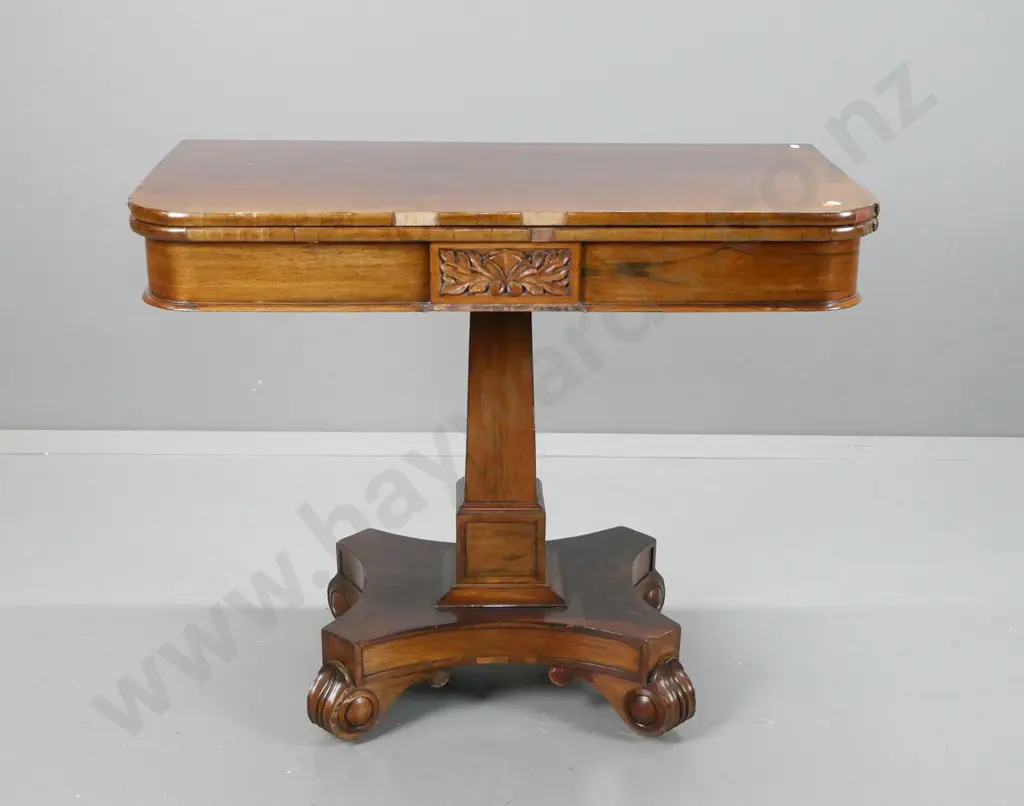 William IV rosewood and walnut card table with fold out revolving top, tapered column base on 4 swirling foliate feet. Image 1++