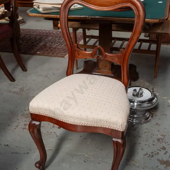 mahogany balloon-back chair with carved back splat, shaped front w/ scrolling cabriolet legs, ivory diamond
