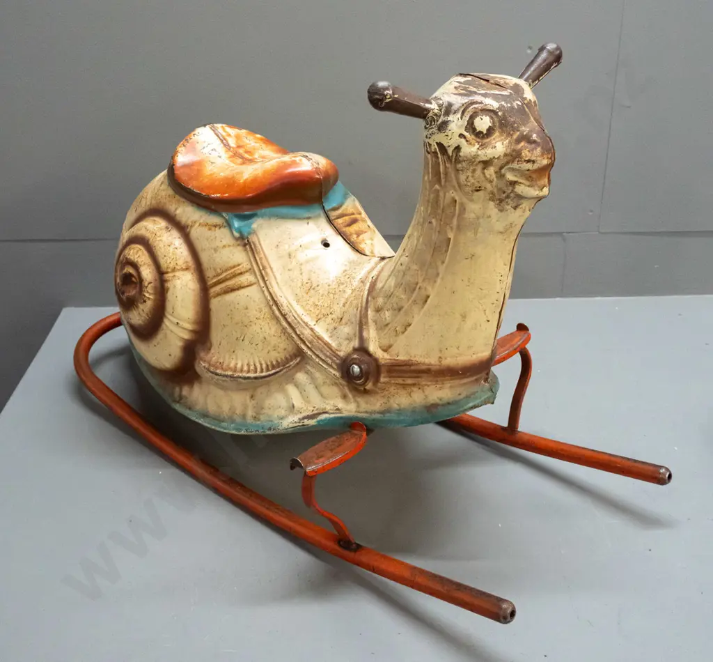 vintage pressed tin child's rocking snail - foot rests marked Mobo - separating down seam, has overall corrosion and Image 1++