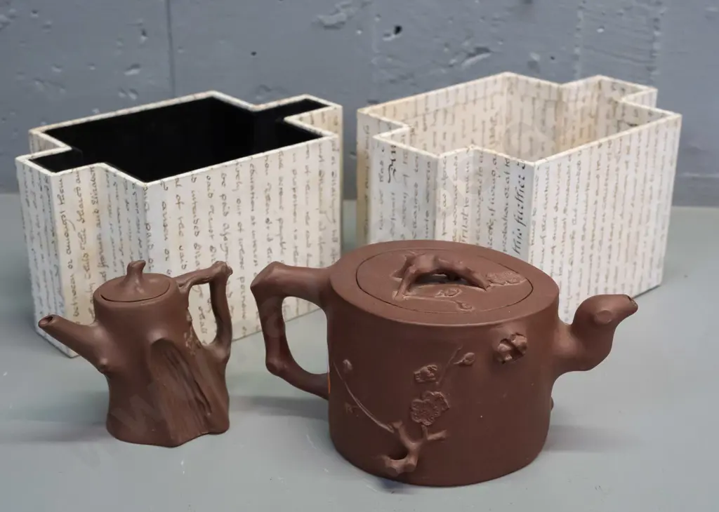 2 Chinese Yixing clay tea pots with applied branch motif decoration and handles, one with fitted faceted box. Larger is Image 1++