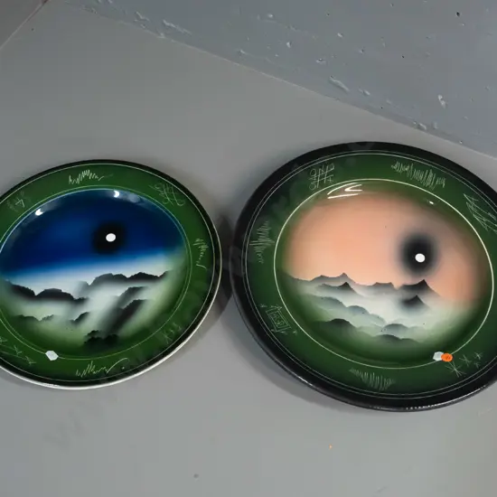 2 Nelson Creek Pottery / Westland NZ wall chargers with mountain and moon decoration - smaller one has patch of rough