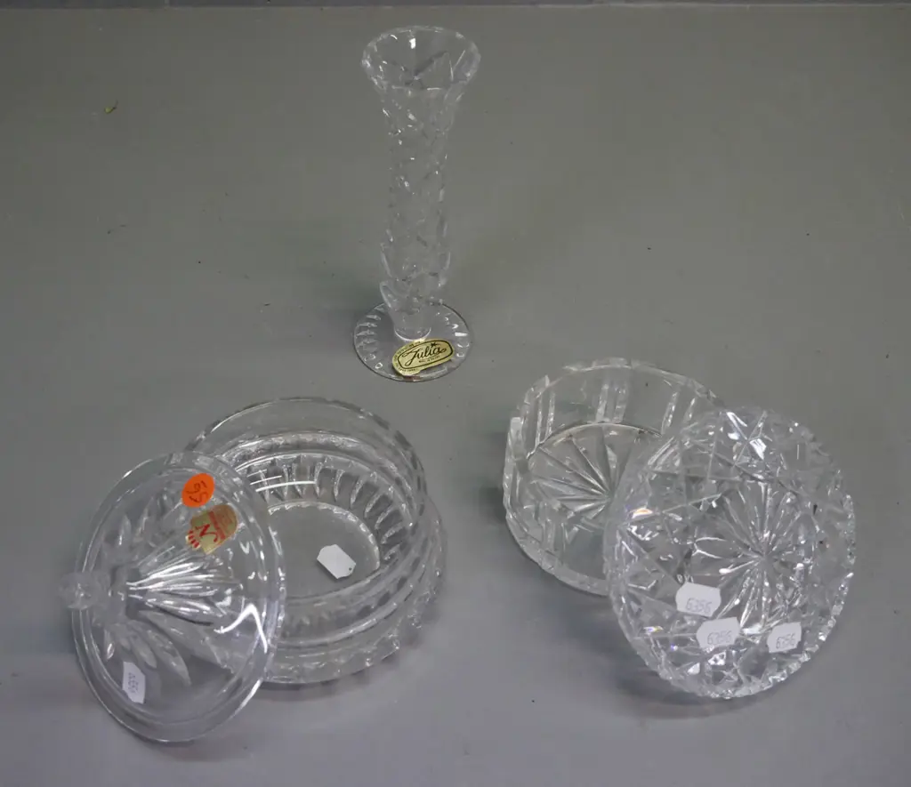 3 crystal items: 2x lidded canisters, 1x cut crystal bud vase marked Julia Made in Poland, 1x canister marked Nachtmann Image 1++