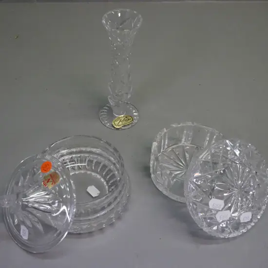 3 crystal items: 2x lidded canisters, 1x cut crystal bud vase marked Julia Made in Poland, 1x canister marked Nachtmann