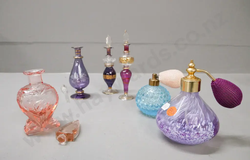 6x coloured glass perfume bottles, 4x w/ stoppers, 2x w/ atomisers. 1x cut glass, 1x moulded glass. Image 1++