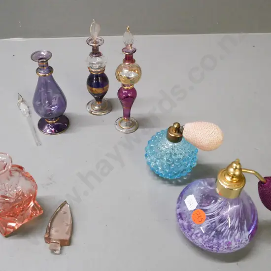 6x coloured glass perfume bottles, 4x w/ stoppers, 2x w/ atomisers. 1x cut glass, 1x moulded glass.
